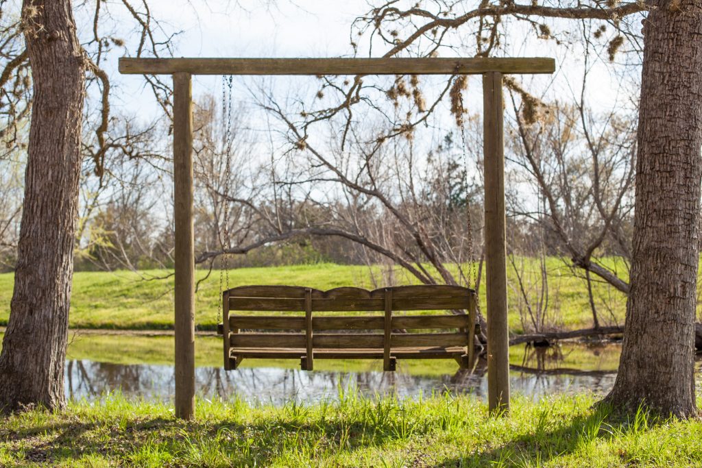 swings from old church pews